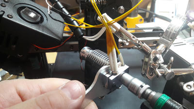 Fixating the nozzle with a heated up heat block