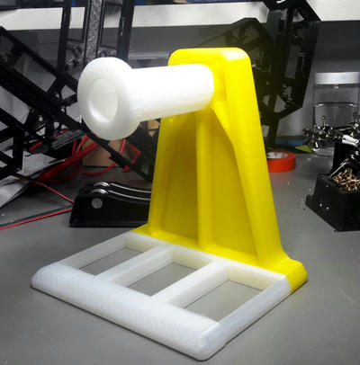 Remix of the Thingiverse Filament Spool Holder by zachlothe